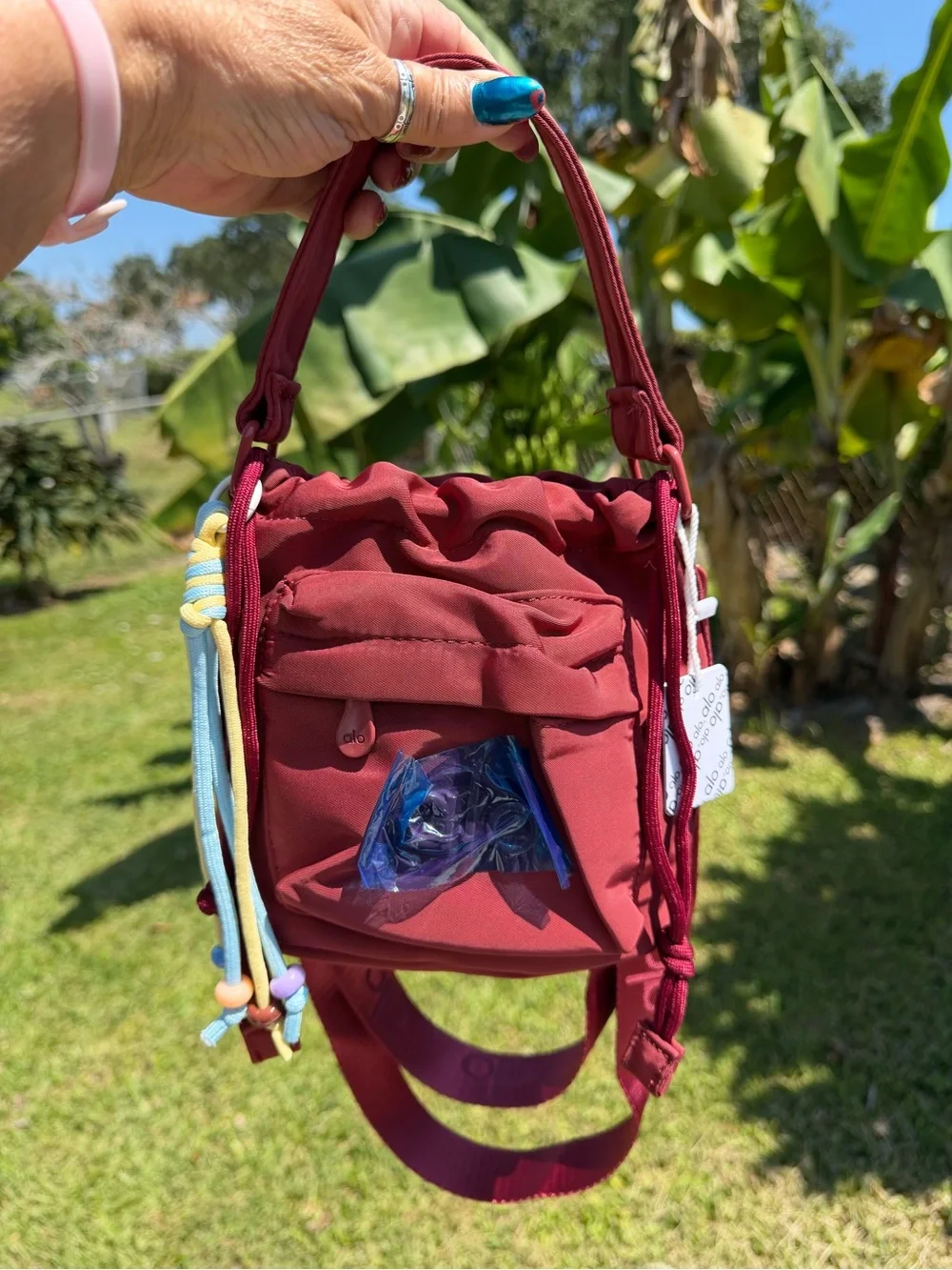 ALO Yoga Burgundy  Drawstring Mini Bucket Bag with Multicolor Cord Tassels